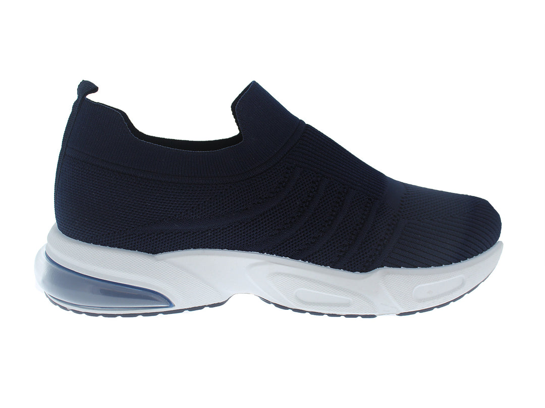 Tenis deportivos FUROR color azul marino con suela blanca, diseño sin cordones en tejido transpirable.