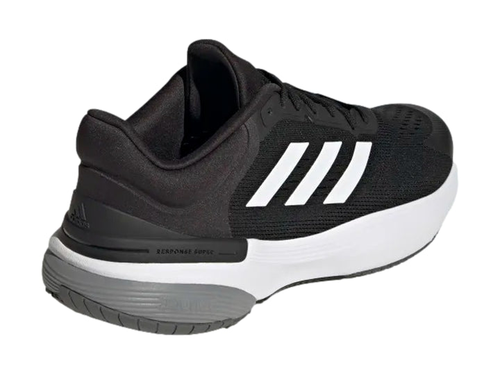 Tenis deportivos Adidas Response Super 3.0 color negro con suela blanca y gris.