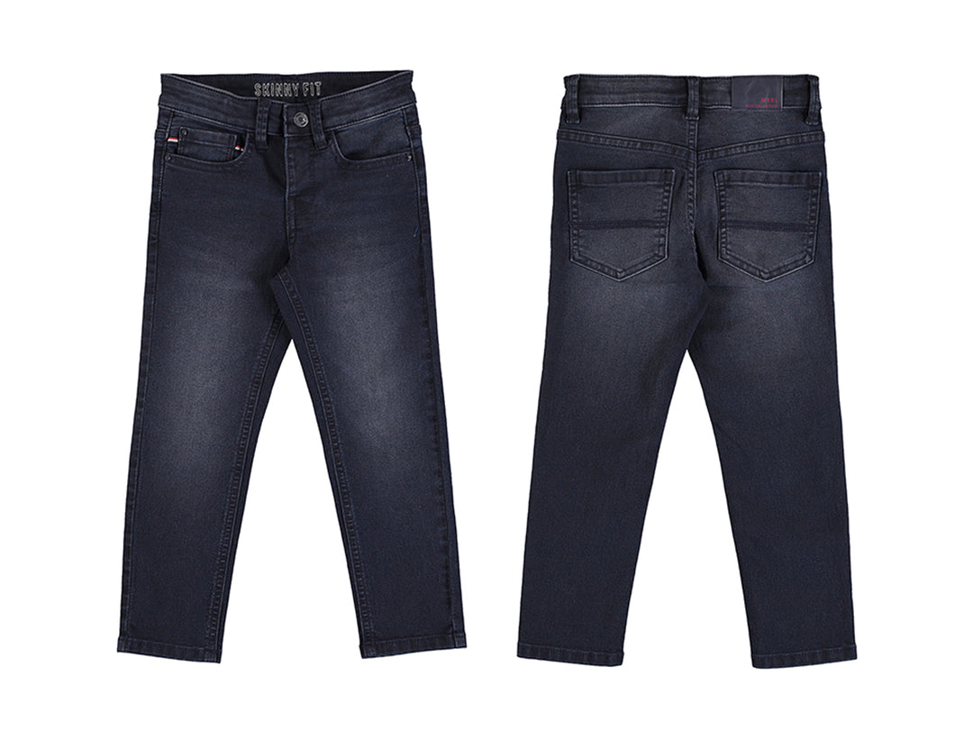 Pantalón denim skinny fit color azul oscuro para niño, vista frontal y posterior.