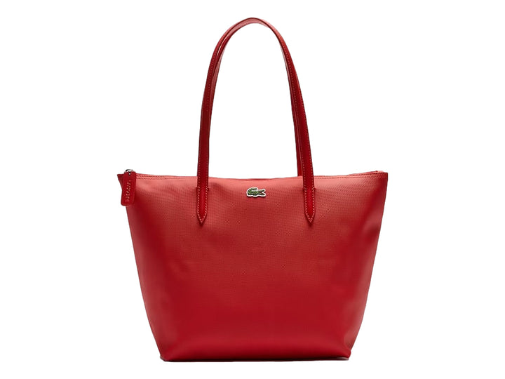 Bolso de hombro Lacoste en color rojo con asas largas y logo frontal metálico sobre fondo blanco.