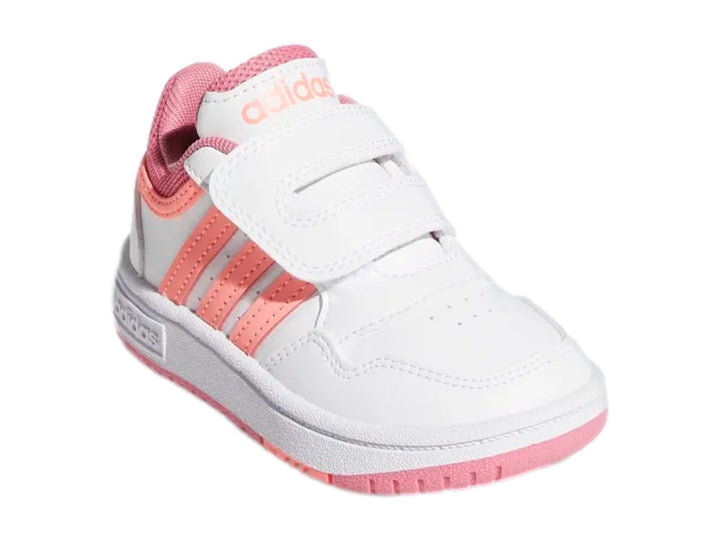 Tenis Adidas blancos con detalles en rosa y cierre de velcro para niños.