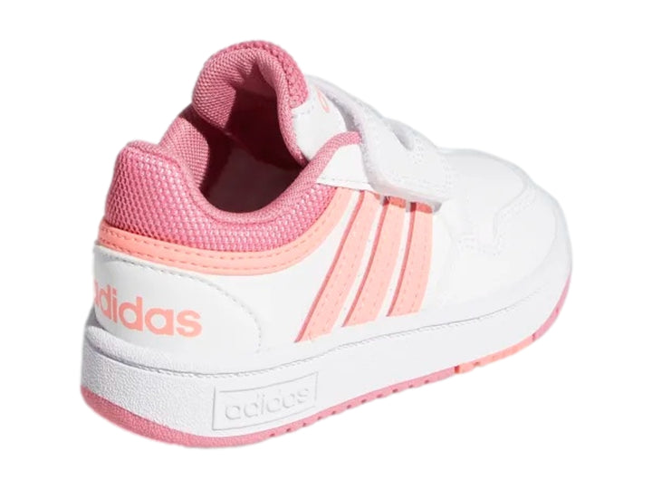 Tenis Adidas blancos con detalles en rosa y cierre de velcro para niños.