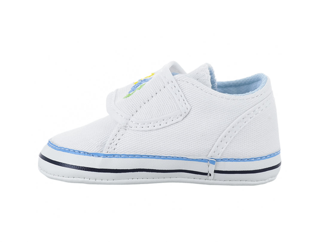 Zapato blanco para bebé de tela con cierre de velcro y letras coloridas.