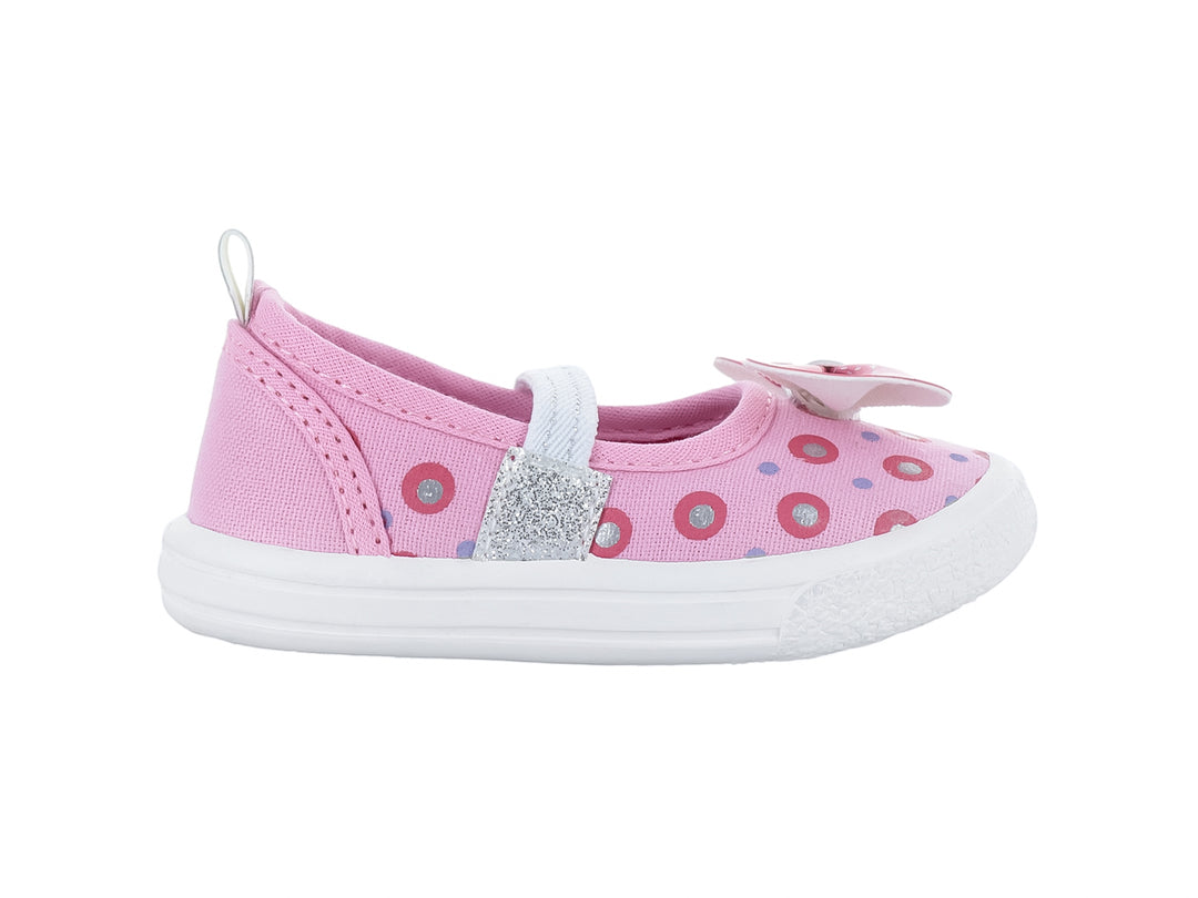 Zapato plano rosa para niña con estampado de puntos, moño decorativo y detalles en plateado brillante.