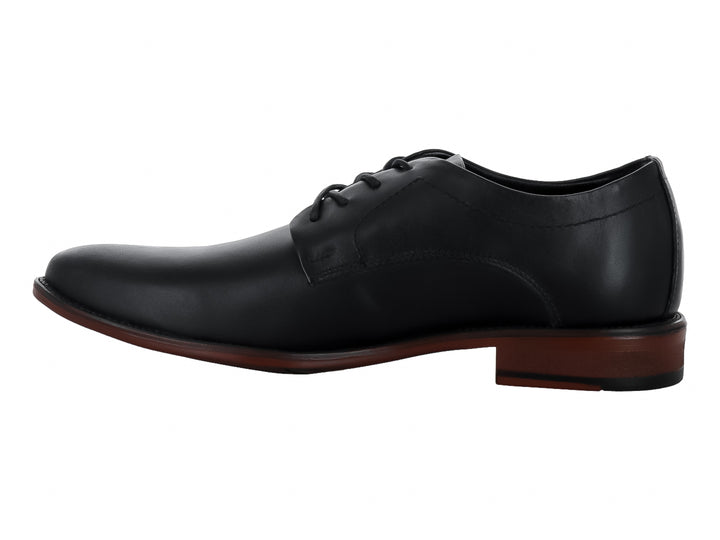 Zapato formal negro para Hombre estilo Oxford con agujetas y suela en tono café.