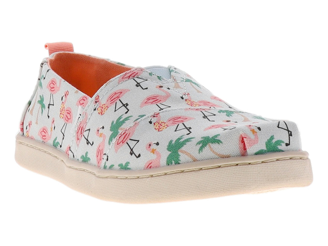 Zapato slip-on blanco con estampado de flamencos rosas y palmeras verdes.