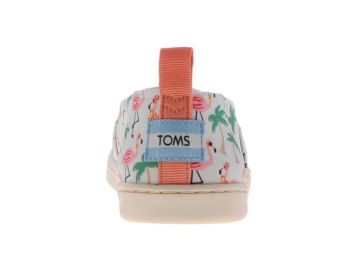 Zapato slip-on blanco con estampado de flamencos rosas y palmeras verdes.