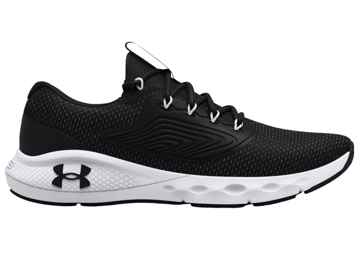 Zapato deportivo Under Armour Charged Vantage 2 en color negro con suela blanca.
