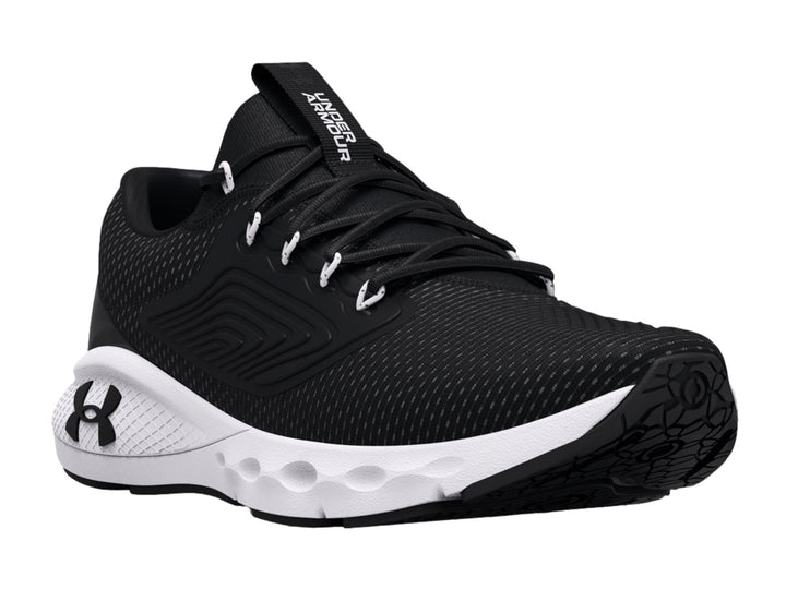 Zapato deportivo Under Armour Charged Vantage 2 en color negro con suela blanca.