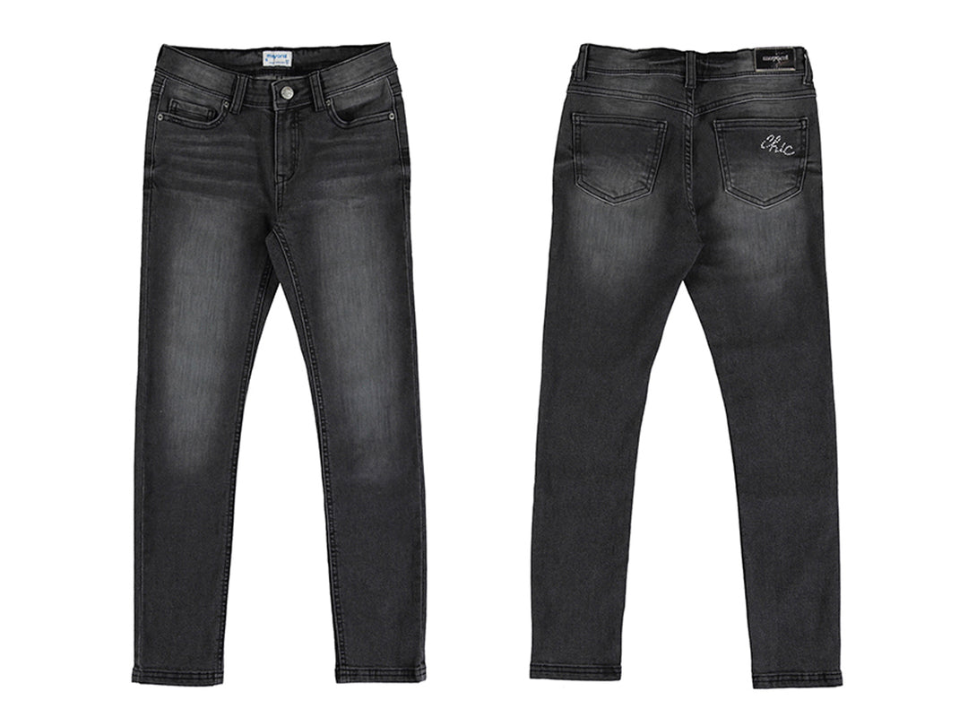 Pantalón largo tejano color gris oscuro con efecto lavado para niño, vista frontal y posterior.