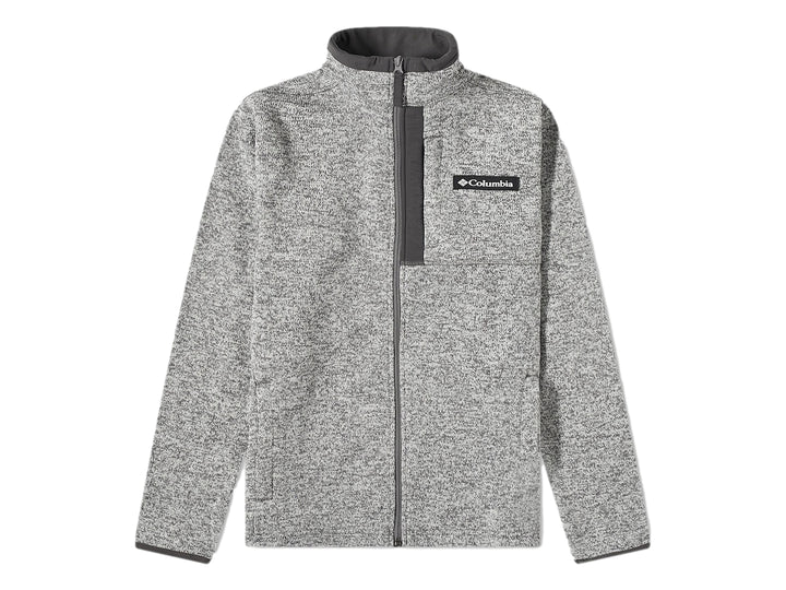 Hombre vistiendo sudadera Columbia color gris jaspeado con cierre frontal y cuello alto.