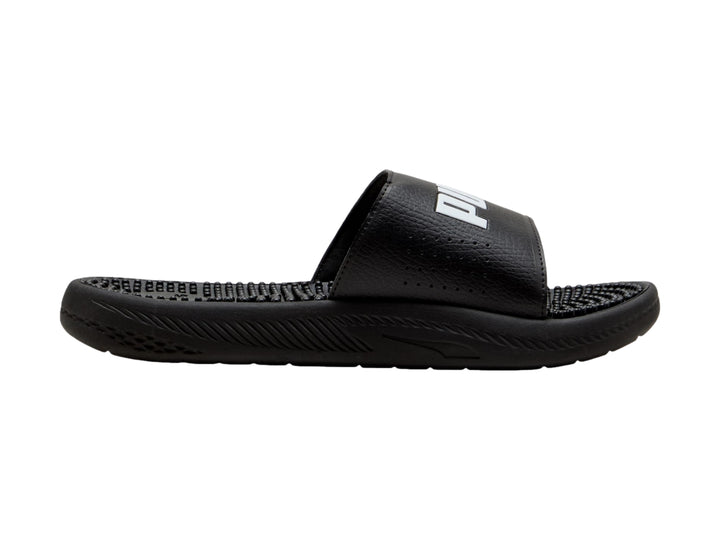Sandalia deslizable PUMA de color negro con logotipo blanco y suela texturizada para masaje.