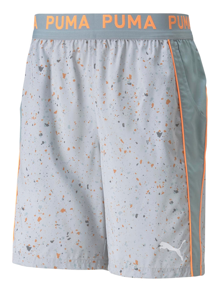 Shorts deportivos PUMA color gris claro con estampado de puntos y franja lateral