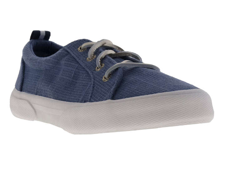 Zapato casual Sperry de tela color azul con suela blanca y agujetas coordinadas.