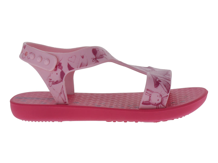 Sandalia rosa Ipanema con estampados de animales y correa al tobillo.