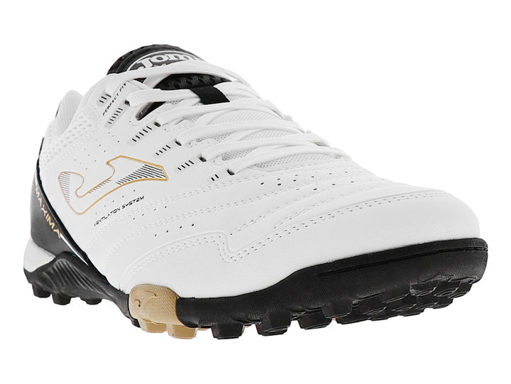 Botín de fútbol Joma Maxima color blanco con suela negra y detalles dorados.