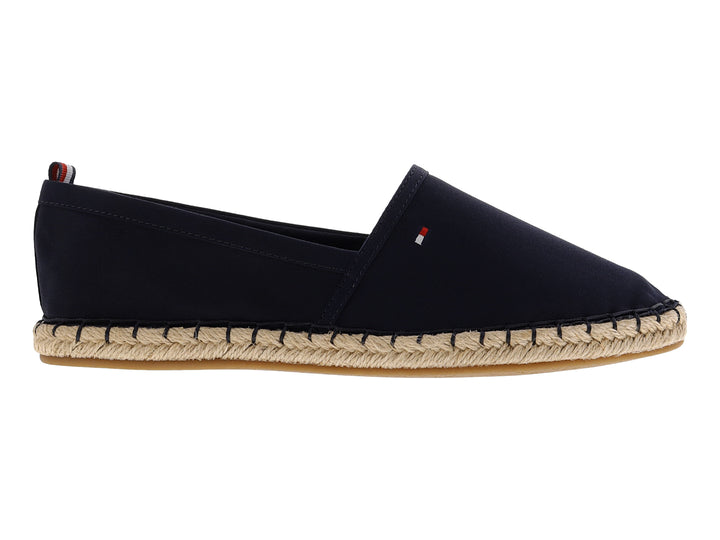 Zapato tipo alpargata de color azul marino con suela de cuerda tejida beige.