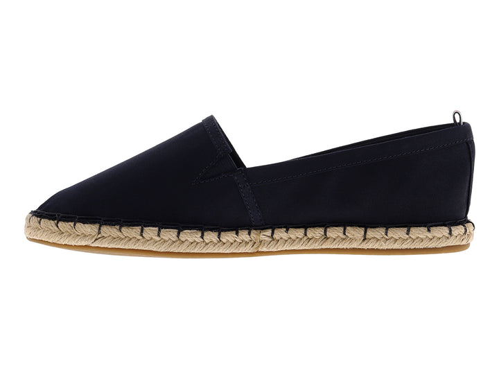 Zapato tipo alpargata de color azul marino con suela de cuerda tejida beige.