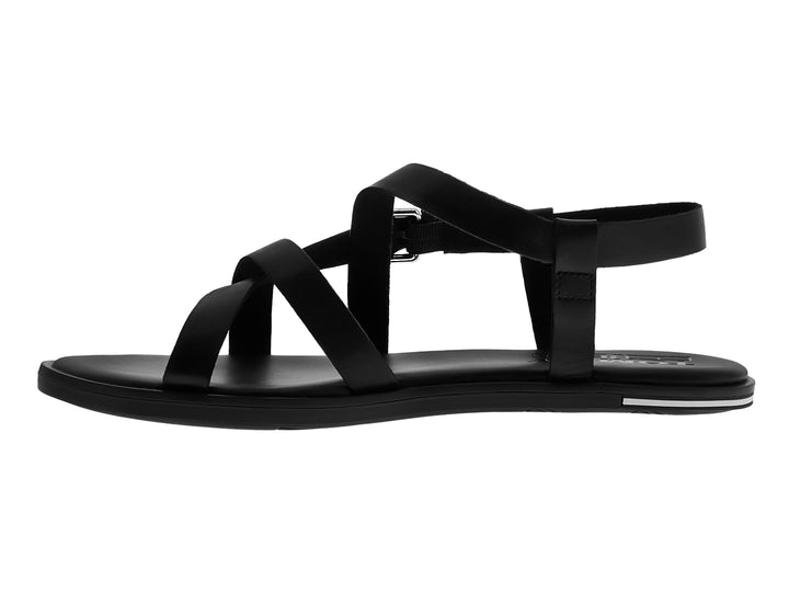 Sandalia negra para mujer de Tommy Hilfiger con tiras cruzadas y hebilla metálica plateada.