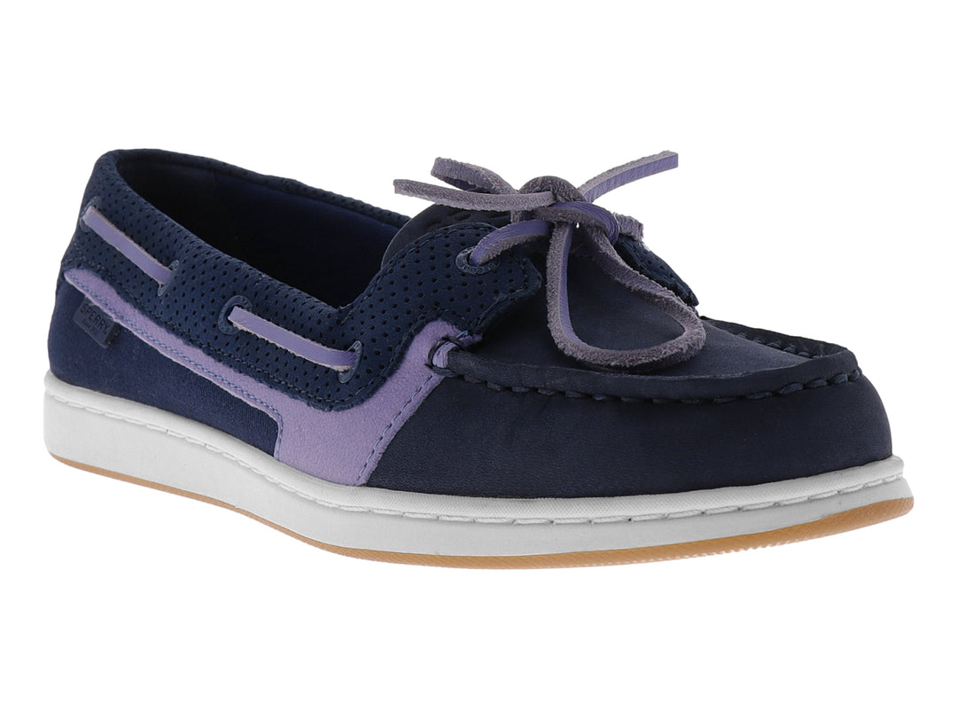 Zapato náutico Sperry color azul marino con detalles en morado y suela blanca.