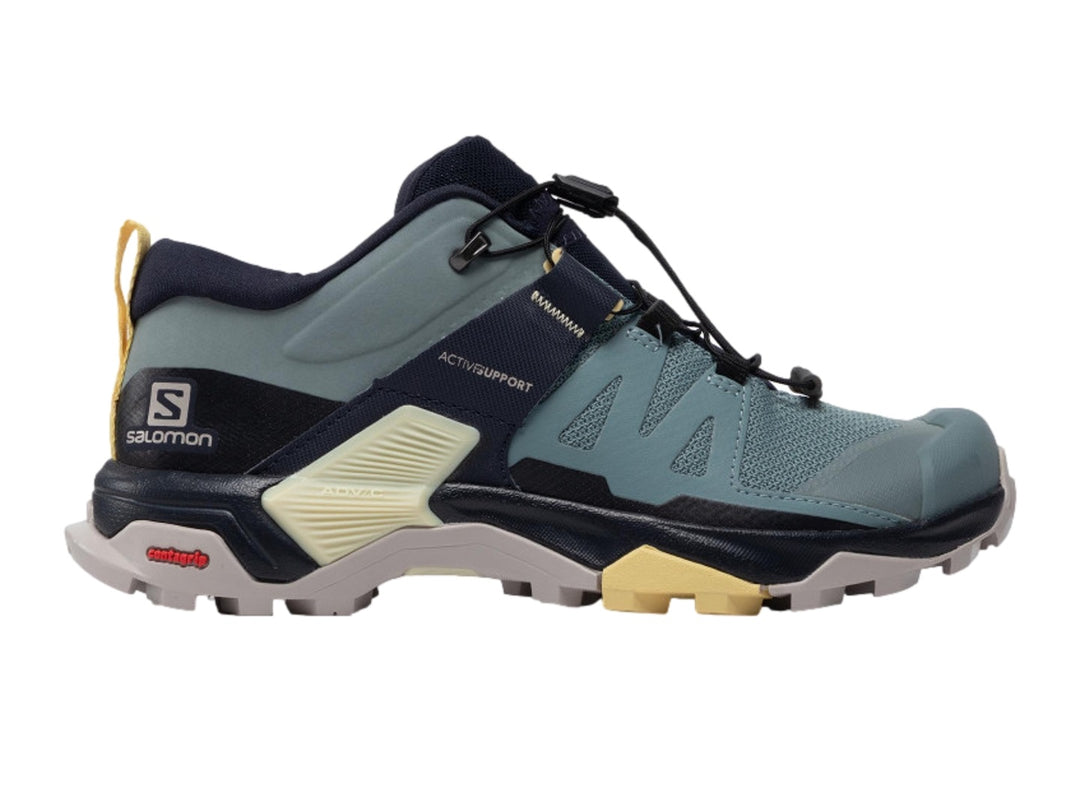 Zapato Salomon X Ultra 4 color azul con detalles amarillos y grises, diseñado para escalada y senderismo.