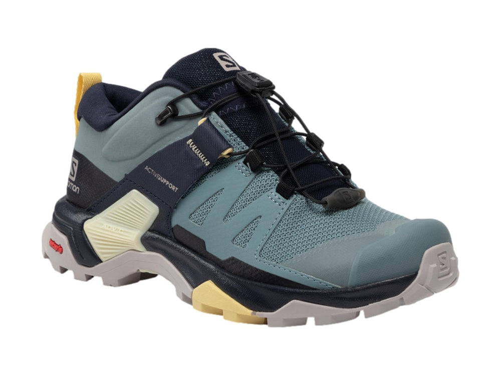 Zapato Salomon X Ultra 4 color azul con detalles amarillos y grises, diseñado para escalada y senderismo.