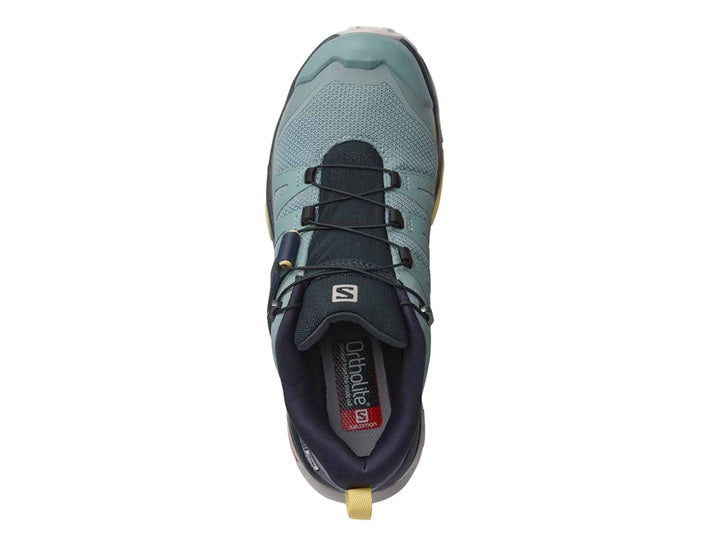 Zapato Salomon X Ultra 4 color azul con detalles amarillos y grises, diseñado para escalada y senderismo.