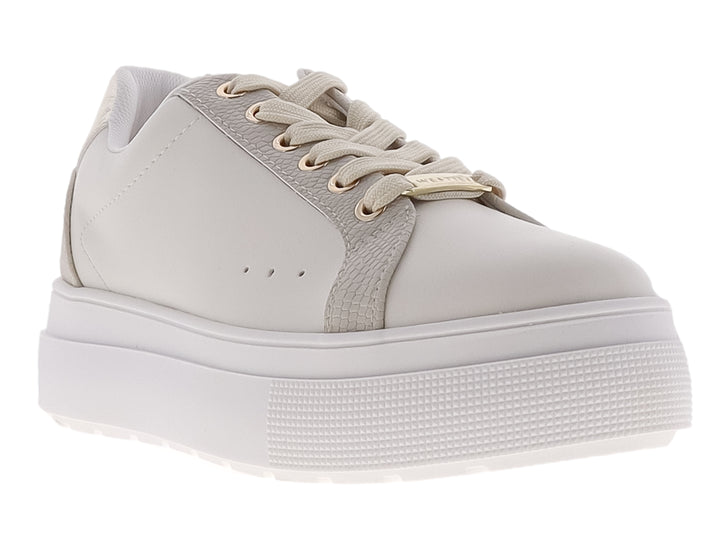 Tenis Westies color ivory con suela de plataforma gruesa y acabado mate.