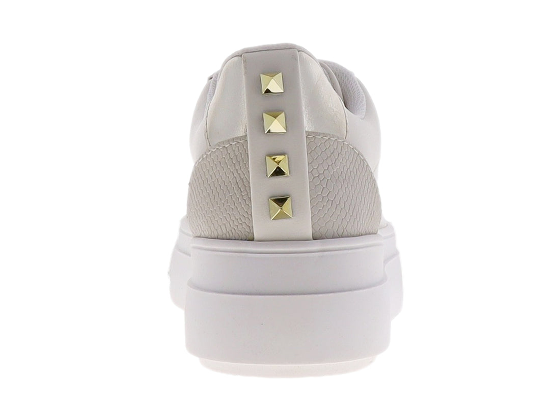 Tenis Westies color ivory con suela de plataforma gruesa y acabado mate.