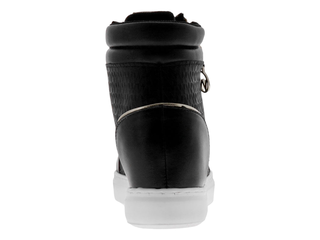 Tenis botín Westies color negro con suela blanca, detalles en dorado y cierre lateral.