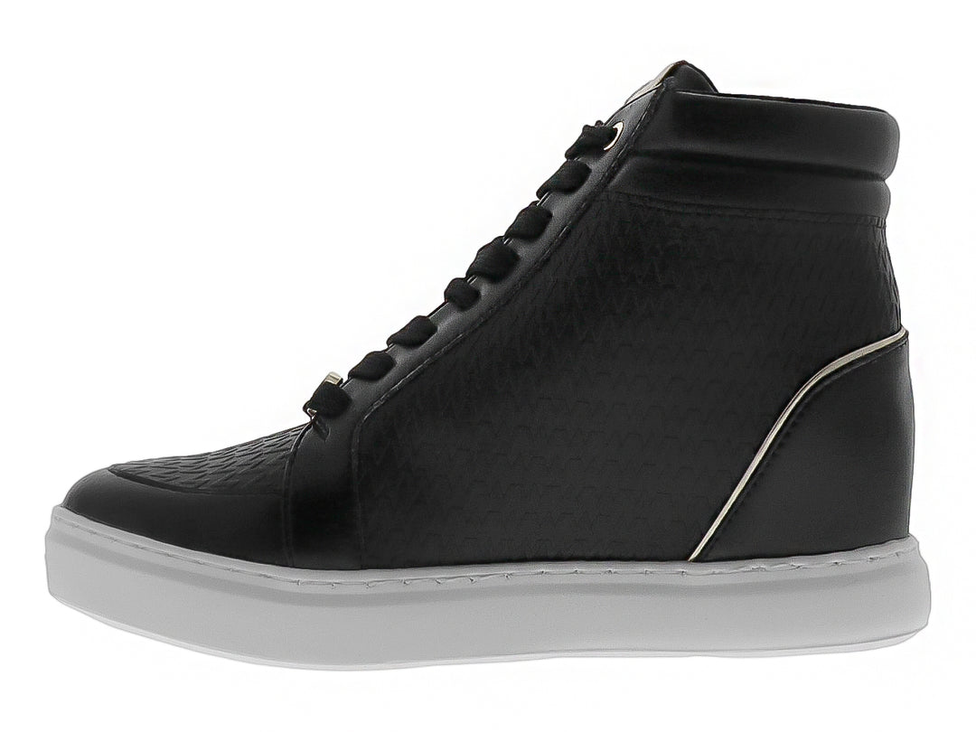 Tenis botín Westies color negro con suela blanca, detalles en dorado y cierre lateral.