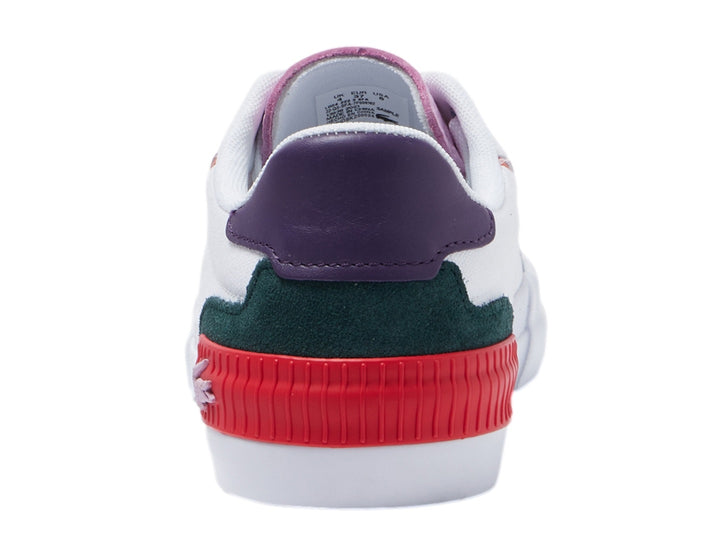 Tenis Lacoste blancos con detalles multicolores en rosa, morado, verde, rojo y amarillo.