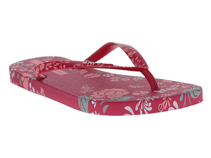 Sandalias Ipanema color rosa con estampado floral en tonos blanco y azul claro.