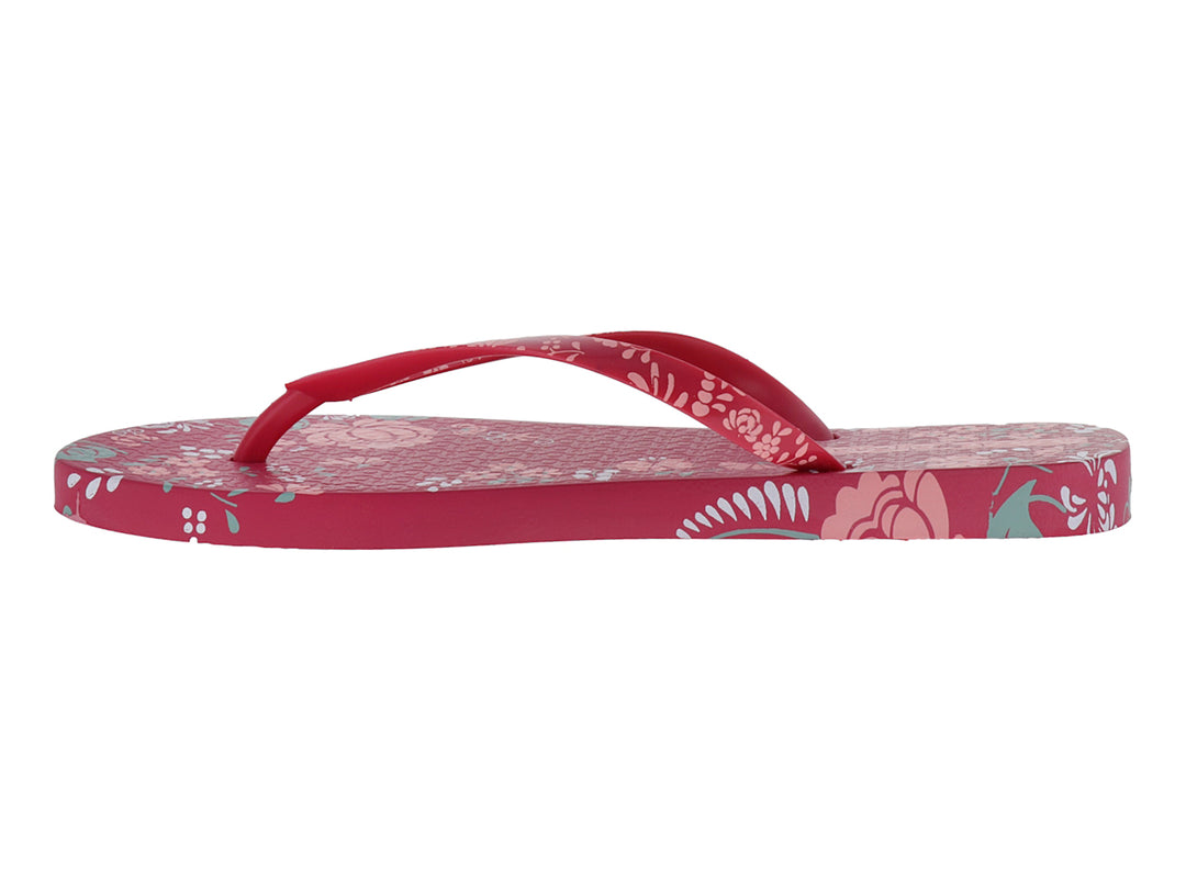 Sandalias Ipanema color rosa con estampado floral en tonos blanco y azul claro.