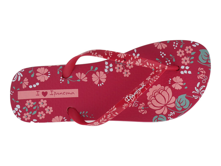 Sandalias Ipanema color rosa con estampado floral en tonos blanco y azul claro.