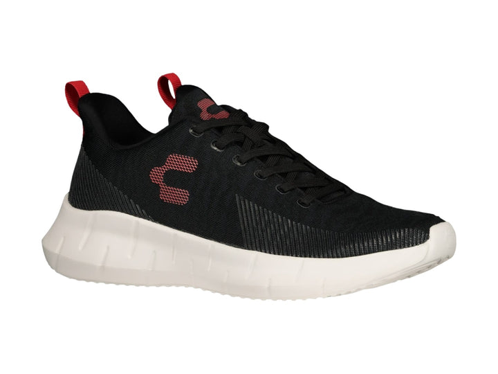 Tenis deportivos Charly color negro con suela blanca y detalles en rojo.