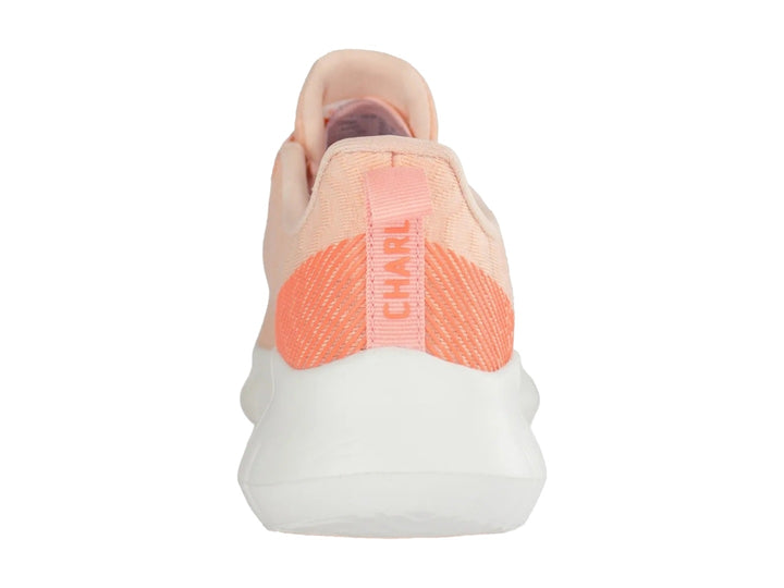 Tenis deportivos Charly color coral con suela blanca y detalles en lila, diseño ligero de tela.