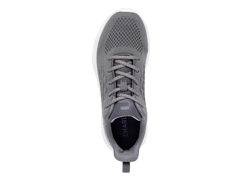 Tenis deportivos Charly color gris con suela blanca y acabado en tejido.
