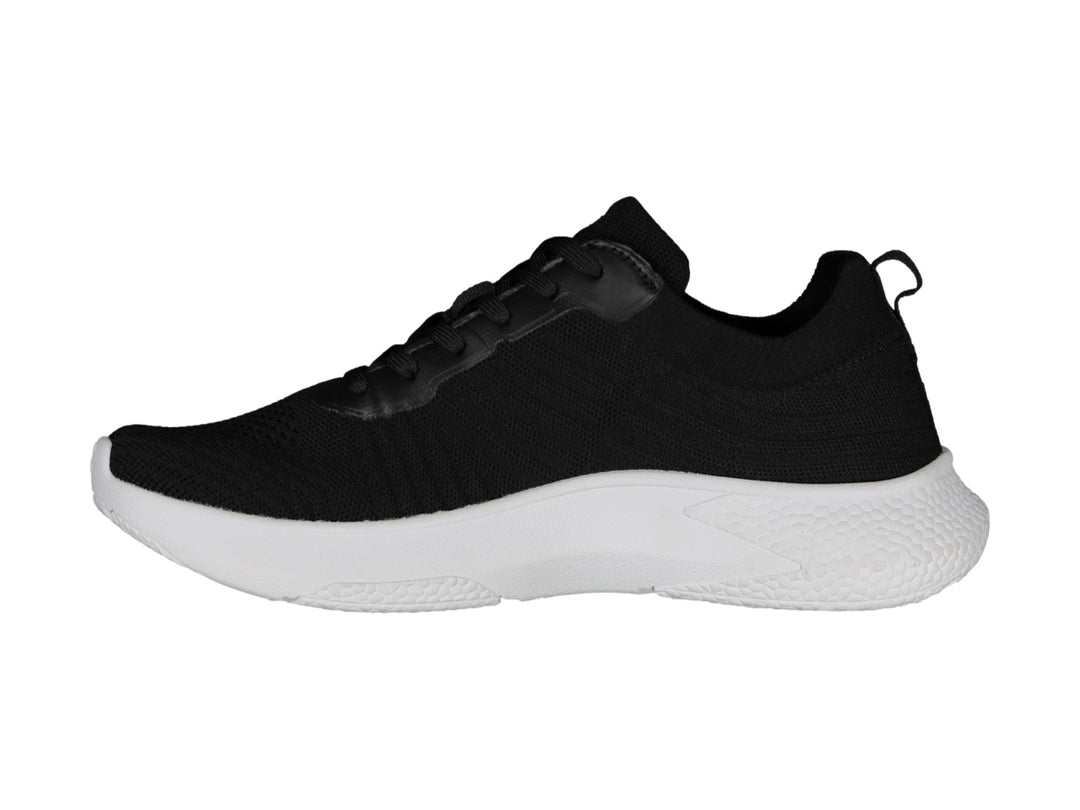 Tenis deportivos Charly color negro con suela blanca.