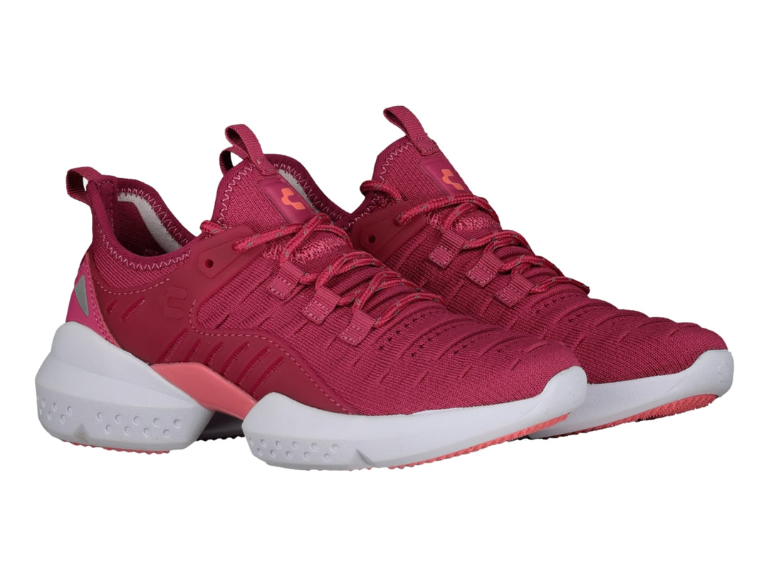 Tenis deportivos Charly en color fucsia con suela blanca y detalles en rosa.