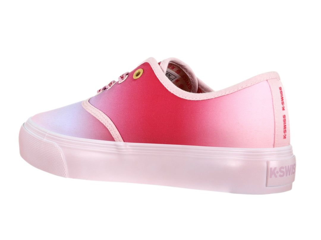 Tenis K-Swiss color rosa con degradado morado, diseño de Lola Bunny y frase Decide Your Vibe.