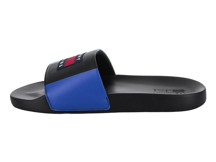 Sandalia Tommy Hilfiger para hombre en color negro con banda superior en gris y azul.
