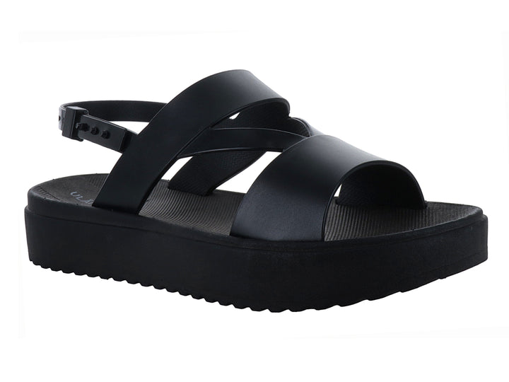 Sandalias negras de plataforma con suela dentada y correas cruzadas con hebilla para mujer.