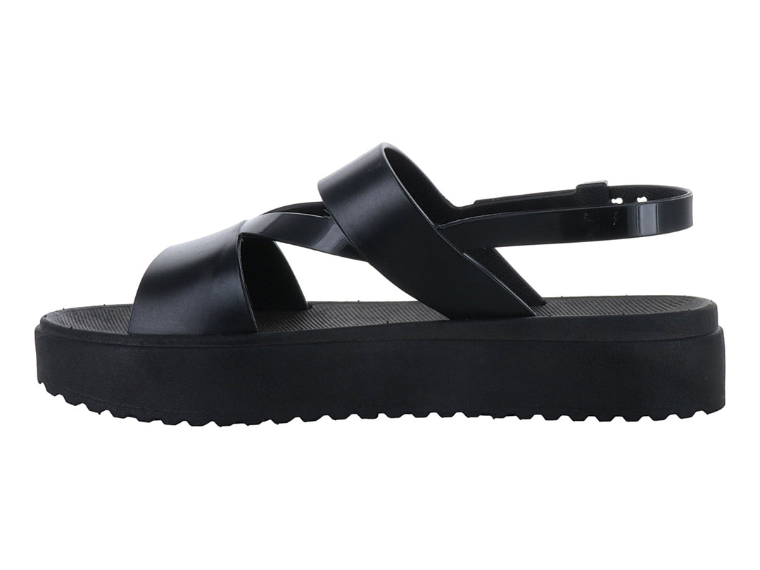 Sandalias negras de plataforma con suela dentada y correas cruzadas con hebilla para mujer.
