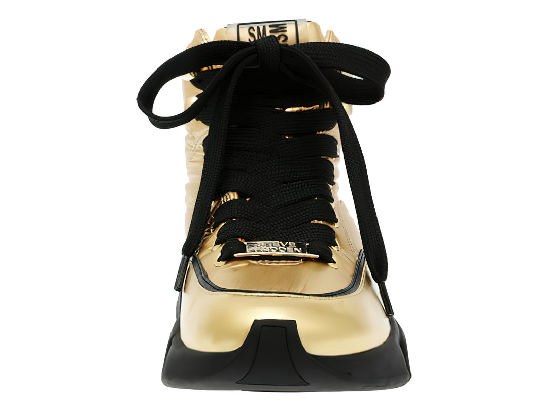 Botas deportivas Steve Madden en color dorado metalizado con suela gruesa y agujetas negras.