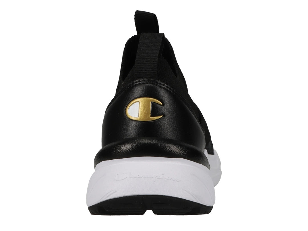 Tenis deportivos Champion color negro con suela blanca y detalles en dorado, estilo slip-on.
