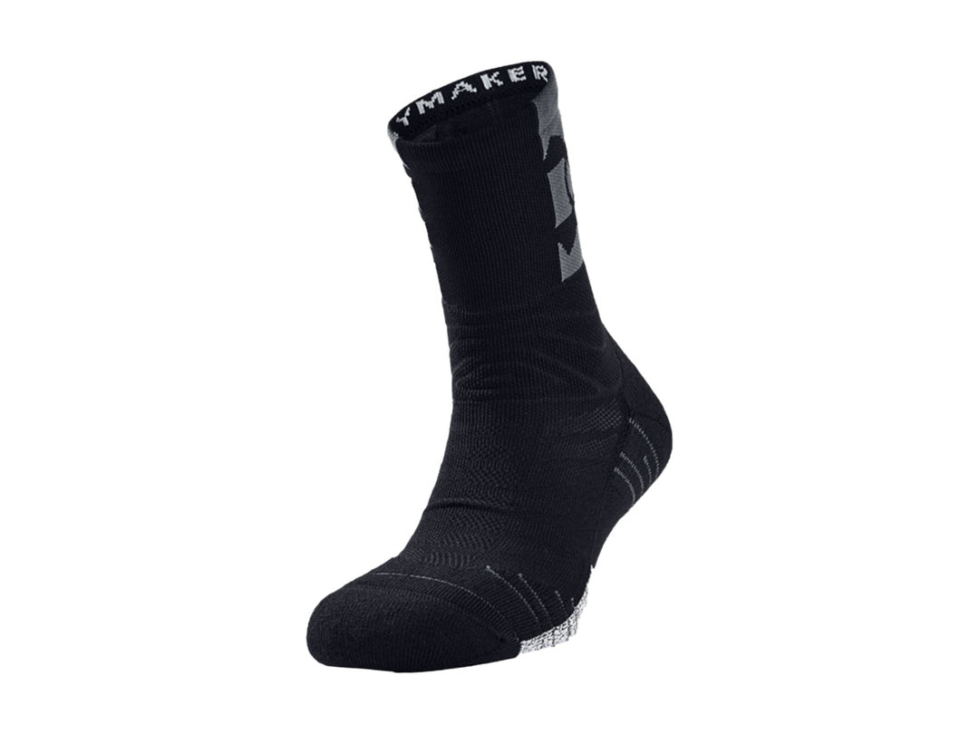 Calcetín deportivo Under Armour modelo Playmaker Mid-Crew en color negro.