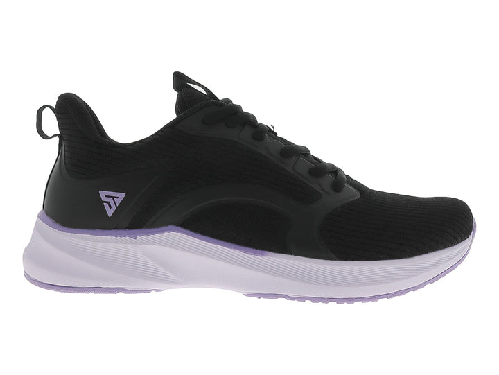 Tenis deportivos JUSTART color negro con suela violeta claro.