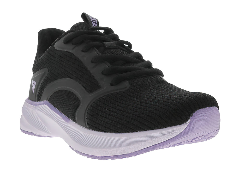 Tenis deportivos JUSTART color negro con suela violeta claro.