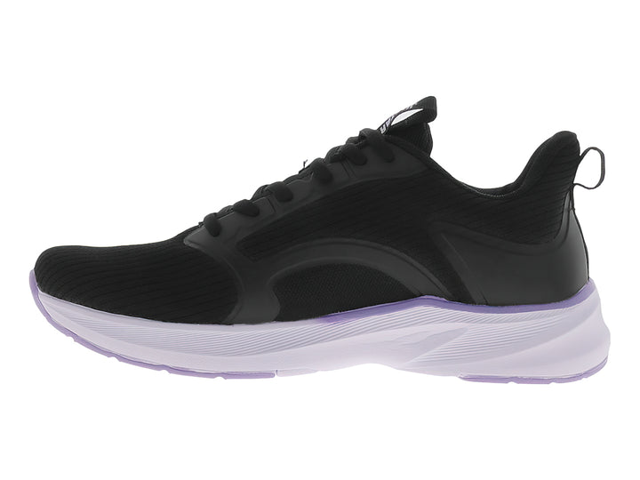 Tenis deportivos JUSTART color negro con suela violeta claro.
